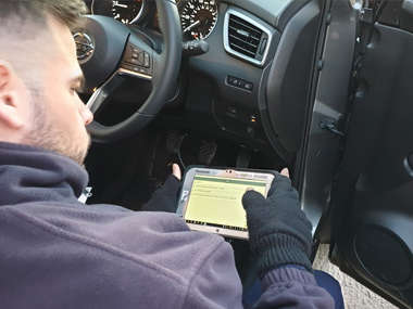 Nissan Qashqai is plugged in to diagnostic equipment during import test Nissan Qashqai diagnostics